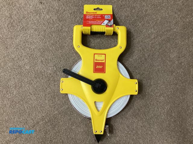 Lot 2-94605 - New New Starrett Fiberglass 200 foot tape measure. Foldable hook  ring measures from zero on the out...