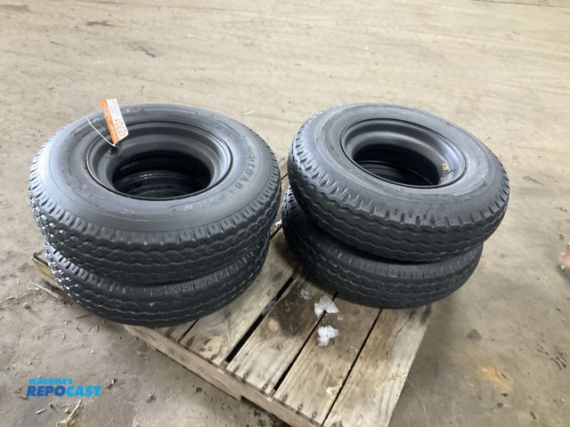 Lot 2-42701 - (4) 8-14.5 tires on steel mobile home style wheels, used
