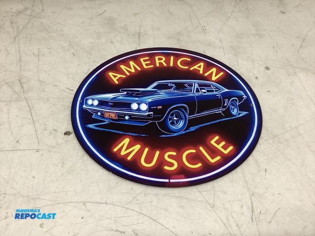 Lot 2-75378 - American muscle circular metal tin sign approx. 8”