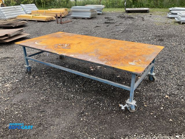 Lot 2-41645 - Steel work bench on casters 96”W x 48-1/2” x 25-1/2”T, top is 1/16” thick steel sheet over plywood, ...