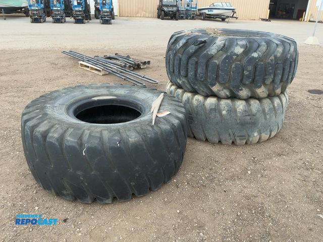 Lot 2-43722 - (3) Assorted Used 23.5-25 Loader Tires, one Titan, one Goodyear