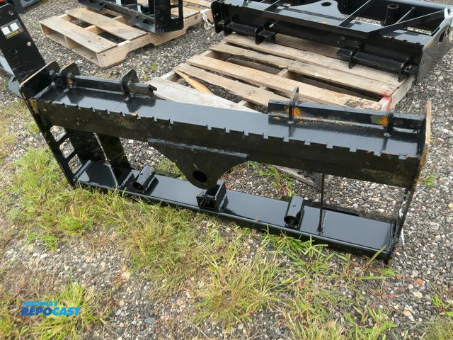 Lot 2-40867 - New Wolverine Fork Carriage Skid Steer Attachment, 16" Carriage, Universal Quick Attach, has 2" rece...