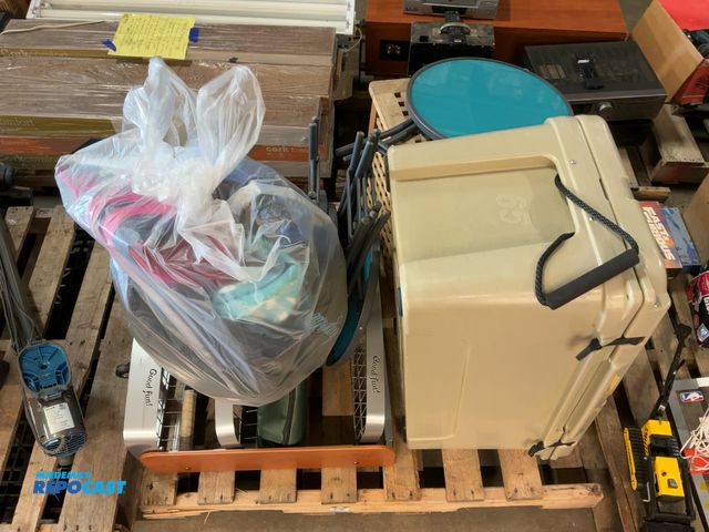 Lot 2-13702 - Skid lot of miscellaneous items including Rtic 65 cooler (tan), bag of snorkeling masks and life jac...