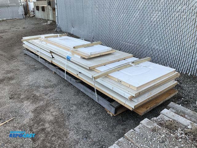 Lot 2-73249 - Skid lot of assorted wood doors and boards