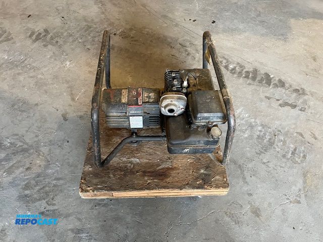 Lot 2-72695 - 1 Homelite HL 2500 Gas Powered Recoil Start Generator Engine turns over would not start, for parts o...