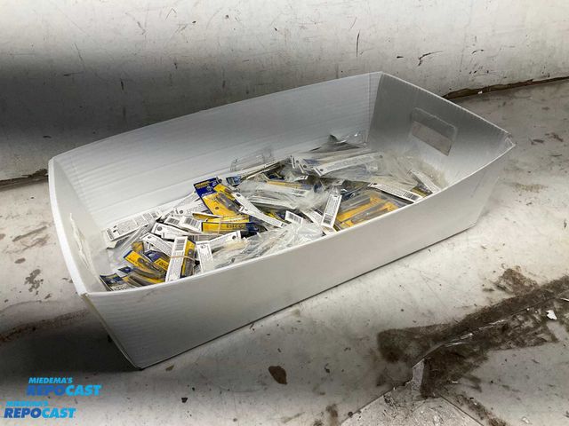 Lot 2-60554 - White bin of many drill bits and screw drivers