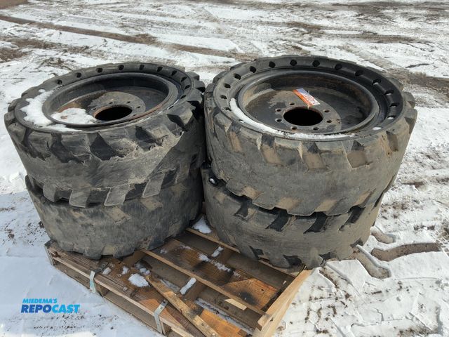 Lot 2-42833 - (4) Used 33x12-20 Solid Rubber Skid Steer Tires/Wheels, 8 on 8” bolt pattern