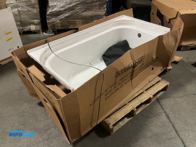Lot 2-38372 - Sterling accord 30” fiberglass bath, above floor drain, has some shipping damage