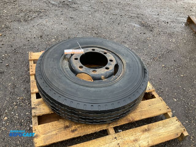 Lot 2-41552 - (1) 8.25R17 tire on a steel 8-bolt wheels, used