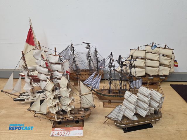 Lot 2-40277 - lot of model ships, as found in an estate.