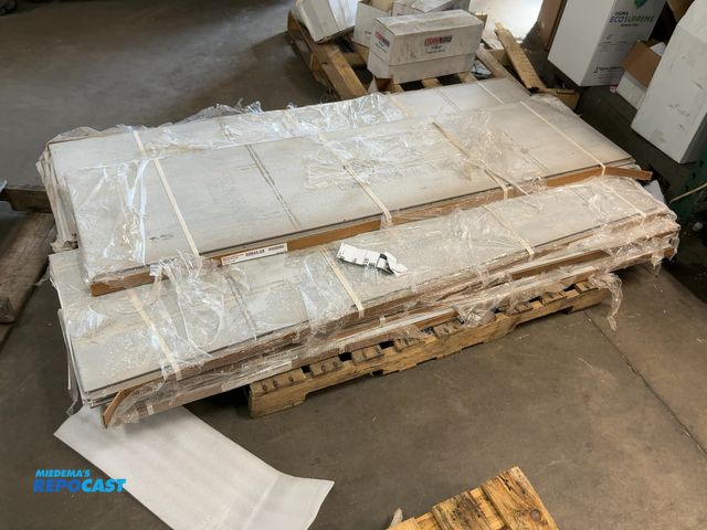 Lot 2-33061 - 9 bundles of concrete siding, each piece is approximately 72” x 18”, ED644