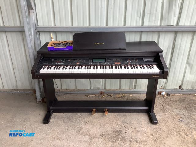 Lot 2-35004 - Technics Electronic Keyboard - the overall size is 52" long x 24" wide x 34"tall - comes in 2-pieces...