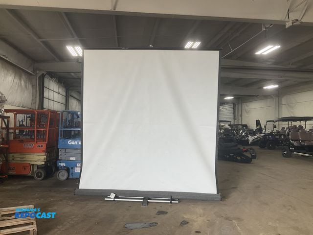 Lot 2-33320 - 10’ projector screen with base and extension pole, used