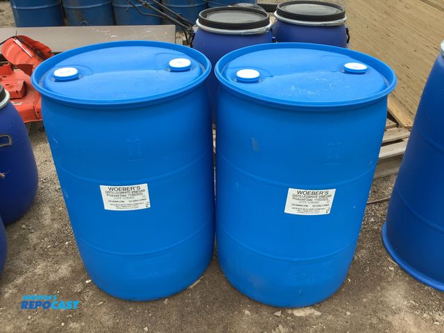Lot 2-62994 - lot of (2) 55 gallon blue plastic barrels with 2 removable bongs. clean inside. contained a food pro...