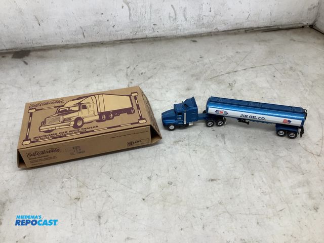 Lot 2-34958 - Ertl collectibles whiteGMC cab with trailer, 1/64 scale die-cast Metal replica