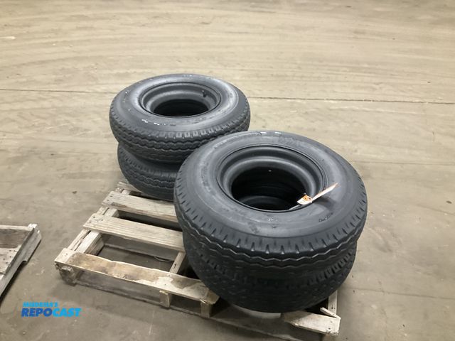Lot 2-42678 - (4) 8-14.5 tires on steel mobile home style wheels, used