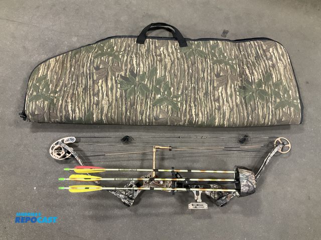 Repocast.com - Lot 2-99688 - Fred Bear bow, RealTree bow case, and 3 ...