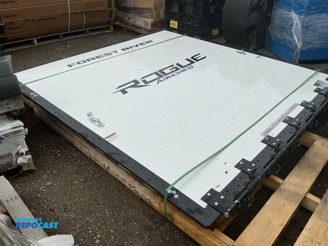 Lot 2-24569 - Rogue rv ramp door measuring 98” x 94”.