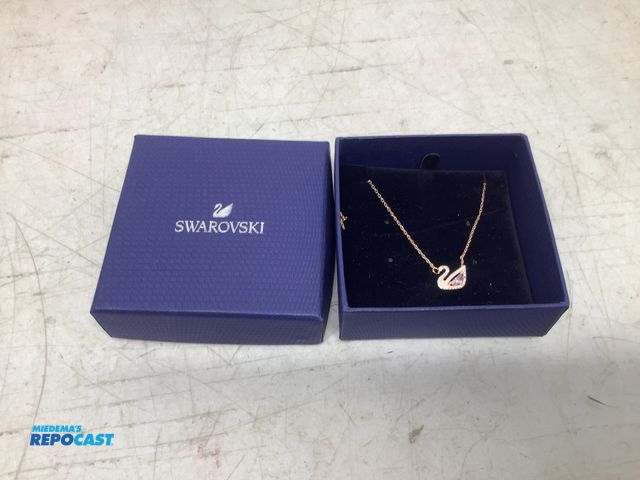 Lot 2-75677 - New Swarovski rose gold swan pendant/necklace