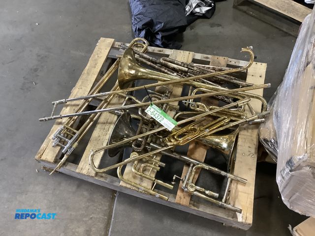 Lot 2-64372 - Lot of (3) gold colored trombones (and parts) and (5) flutes (all the instruments need cleaning), un...