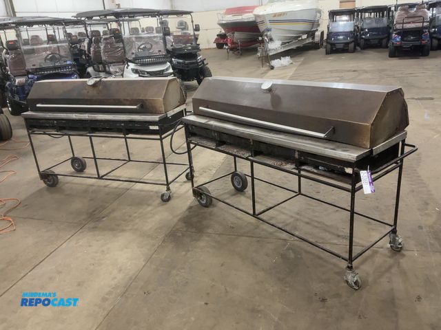 Lot 2-33681 - (2) Used Lazy Man 66” Charcoal Type Gas Broilers on Casters, Have Lids, Run off Propane, scattered d...