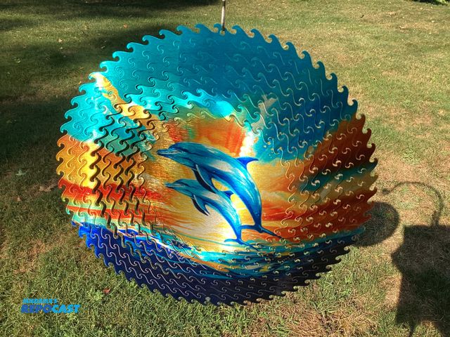 Lot 2-92897 - New Spinfinity Designs wind spinner. Stainless Steel Metallic finish shimmers in the sunlight and tw...