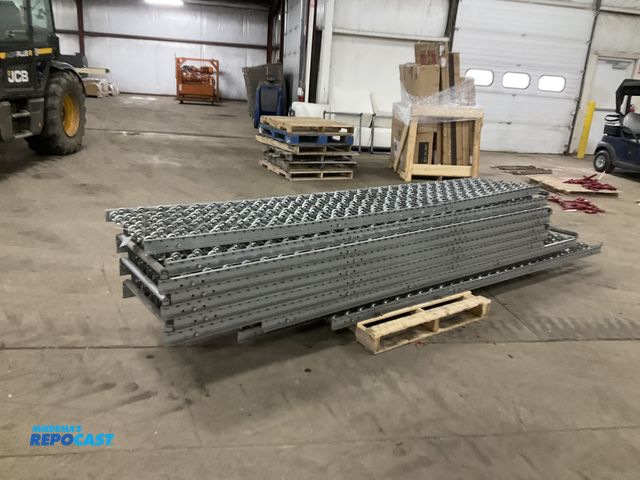 Lot 2-33517 - (10) 24”W x 10’L sections of skate wheel gravity conveyor, used one is bent on one end