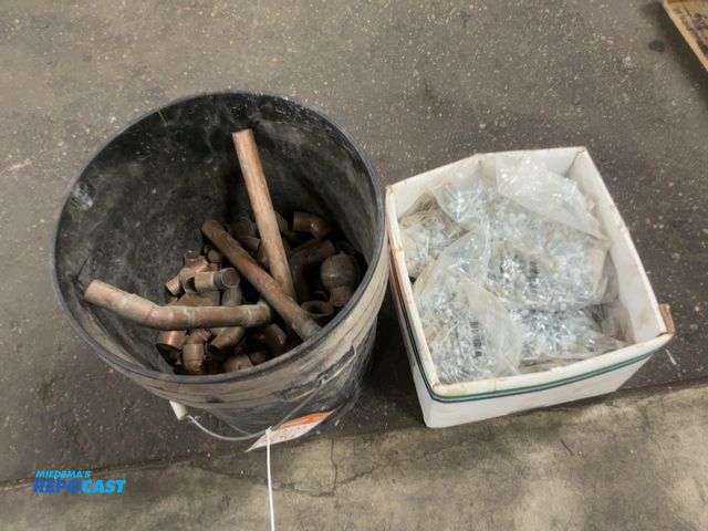 Lot 2-40402 - Lot of a bucket of assorted copper pipe fittings and box of White 10x1-1/2" Pole Barn Screws