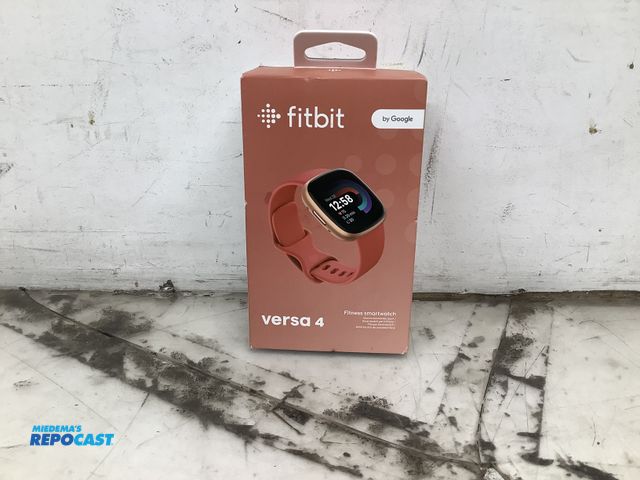 Lot 2-63314 - New Fitbit FB523 (1) new Fitbit versa 4 by google 24mm copper rose aluminum case and pink sand infin...