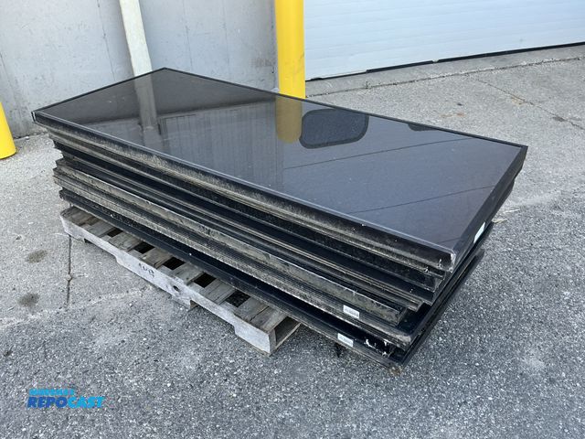 Lot 2-76755 - Stack of 12 solar panels 63” x 27” x 2”