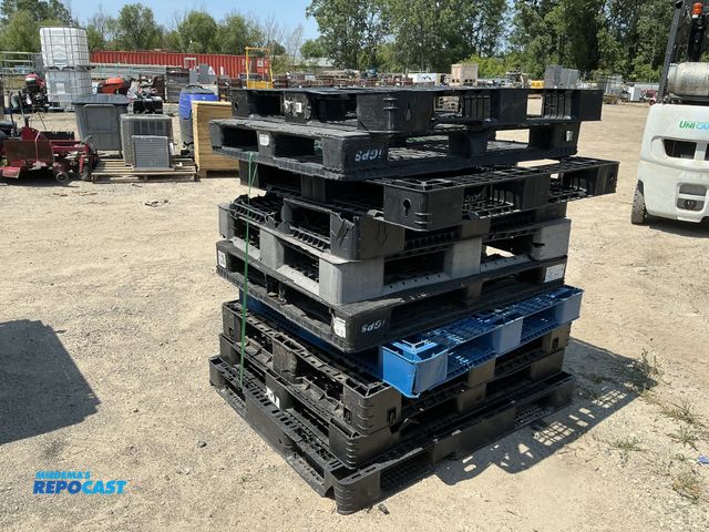 Lot 2-28653 - Stack of (10) blue and black plastic stackable skids approx 43” x 42” x 5” - various conditions