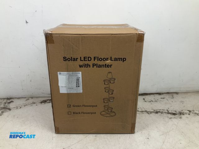 Lot 2-94470 - New Metal outdoor floor lamp, solar LED with planter, green