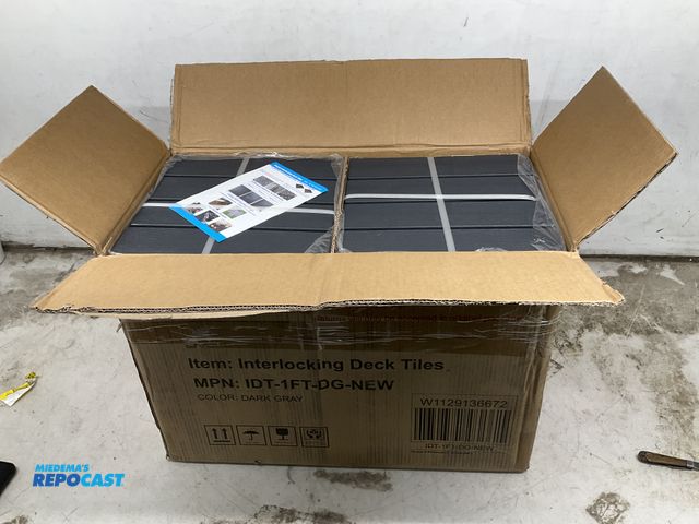 Lot 2-60936 - New box of (44) item number IDT-1FT-DG-NEW,  approx. 25” x 12.5” x 18” dark gray interlocking deck t...