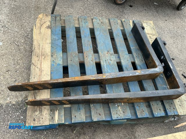 Lot 2-96551 - (2) rusty Forklift Forks