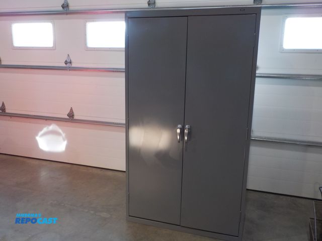 Lot 2-34140 - Tennsco two door personal storage cabinet. Three shelves. 36" w x 18" d x 64" h
