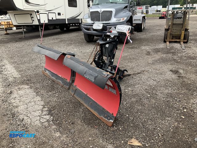 Lot 2-40159 - Western MVP Plus 9’ 6” v-blade snowplow with controller, metal cutting edge an plow face, spring tri...