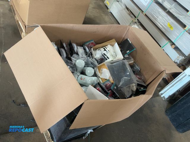 Lot 2-11112 - Skid of Assorted New Semi Truck Parts, includes filters, lights, hardware, a/c compressor, and more,...