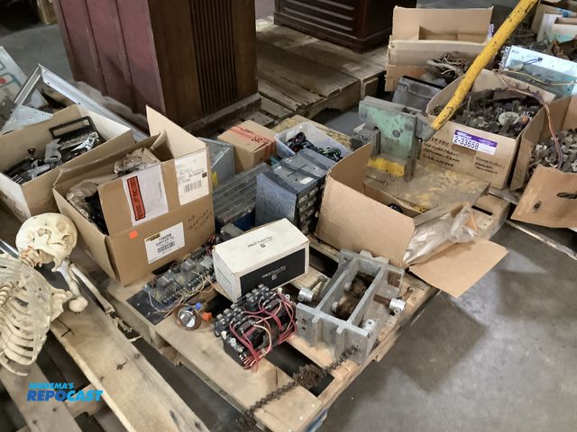 Lot 2-33656 - Skid lot of various industrial materials including a sheet metal corner notcher, speaker crossover n...