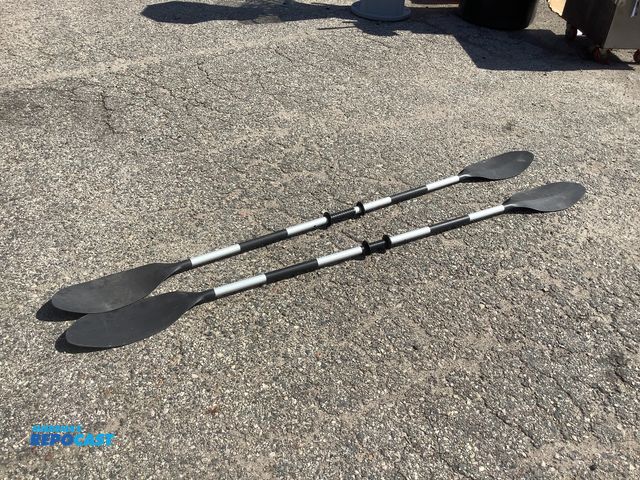 Lot 2-94957 - 2 Black and silver kayak paddles, both are 86” long