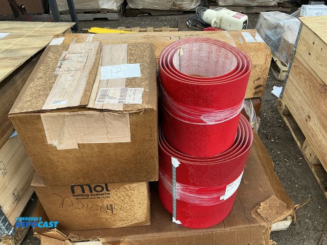 Lot 2-69600 - Skid lot of various rolls of red FLEXCO vinyl wall base or rubber sports flooring formats