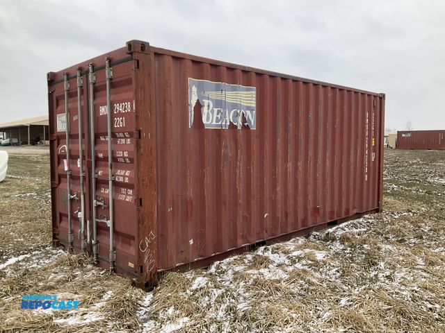 Lot 2-23919 - 20’ Shipping / Storage Container 8’ wide x 8’ 6” tall, swing doors on one end, wood deck, rings for ...