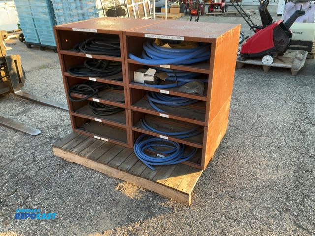 Lot 2-24773 - (2) Industrial storage racks that hold various types of automotive and electric hoses, organized by ...