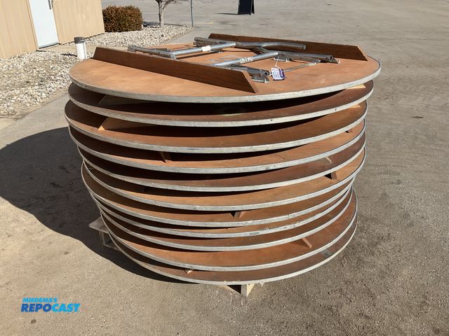 Lot 2-33662 - (11) wooden foldable round tables. Measures 5’ in diameter.