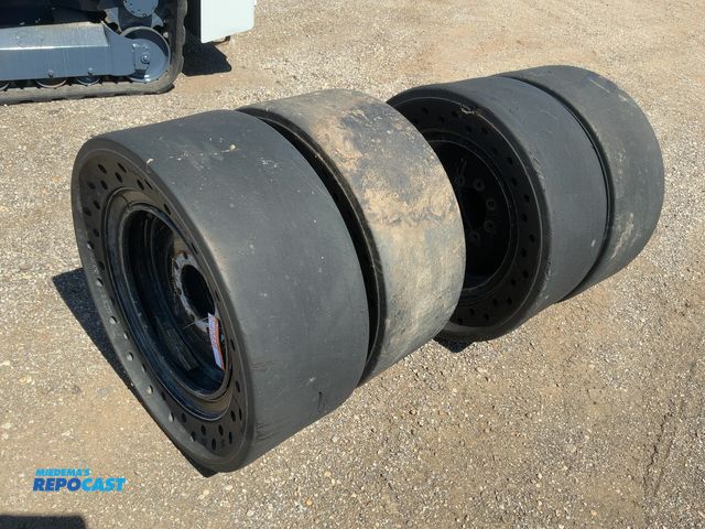 Lot 2-40836 - (4) West Lake Size 36x14-20 Solid Rubber Tires and Wheels for Skid Steer, 8 on 8" bolt pattern