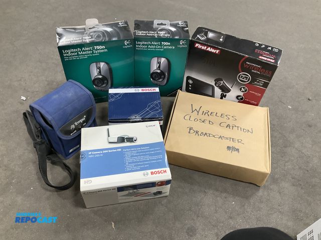 Lot 2-67896 - Box full of various surveillance: Logitech Alert™ 750n Indoor Master System &amp; 700n indoor add-on...