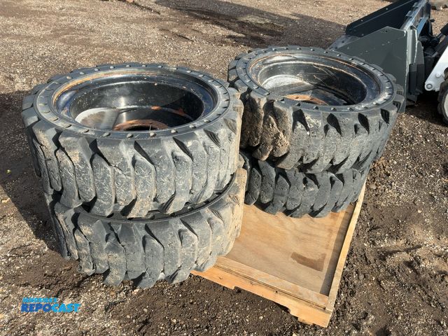 Lot 2-42993 - (4) Used Brawler SolidFlex HPS Size 33x12-20 Solid Rubber Skid Steer Tires and Wheels, 8 on 8” bolt ...