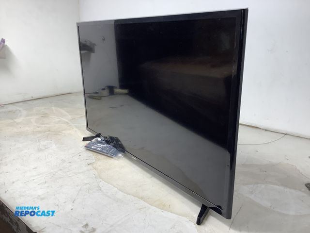 Lot 2-27354 - Samsung  flat screen television, 40" with remote and hardware, can be wall mounted or has removable ...