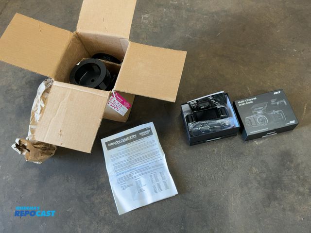 Lot 2-20340 - Lot of a IIWEY Model N5 Multi-Channel Dash Cam and a Rough Country 2" Lift Kit for 06-Up Jeep Comman...