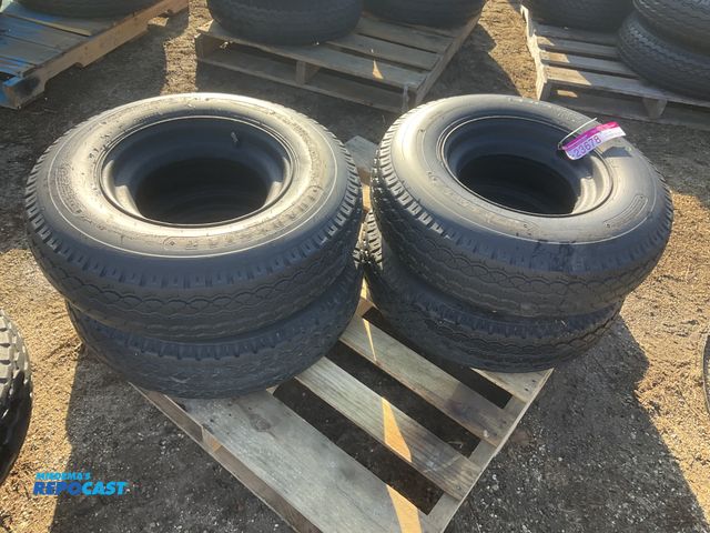 Lot 2-23678 - (4) 8-14.5 tires on steel mobile home style wheels, used