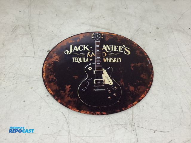Lot 2-75387 - Jack Aniee’s circular metal tin sign approx. 8”